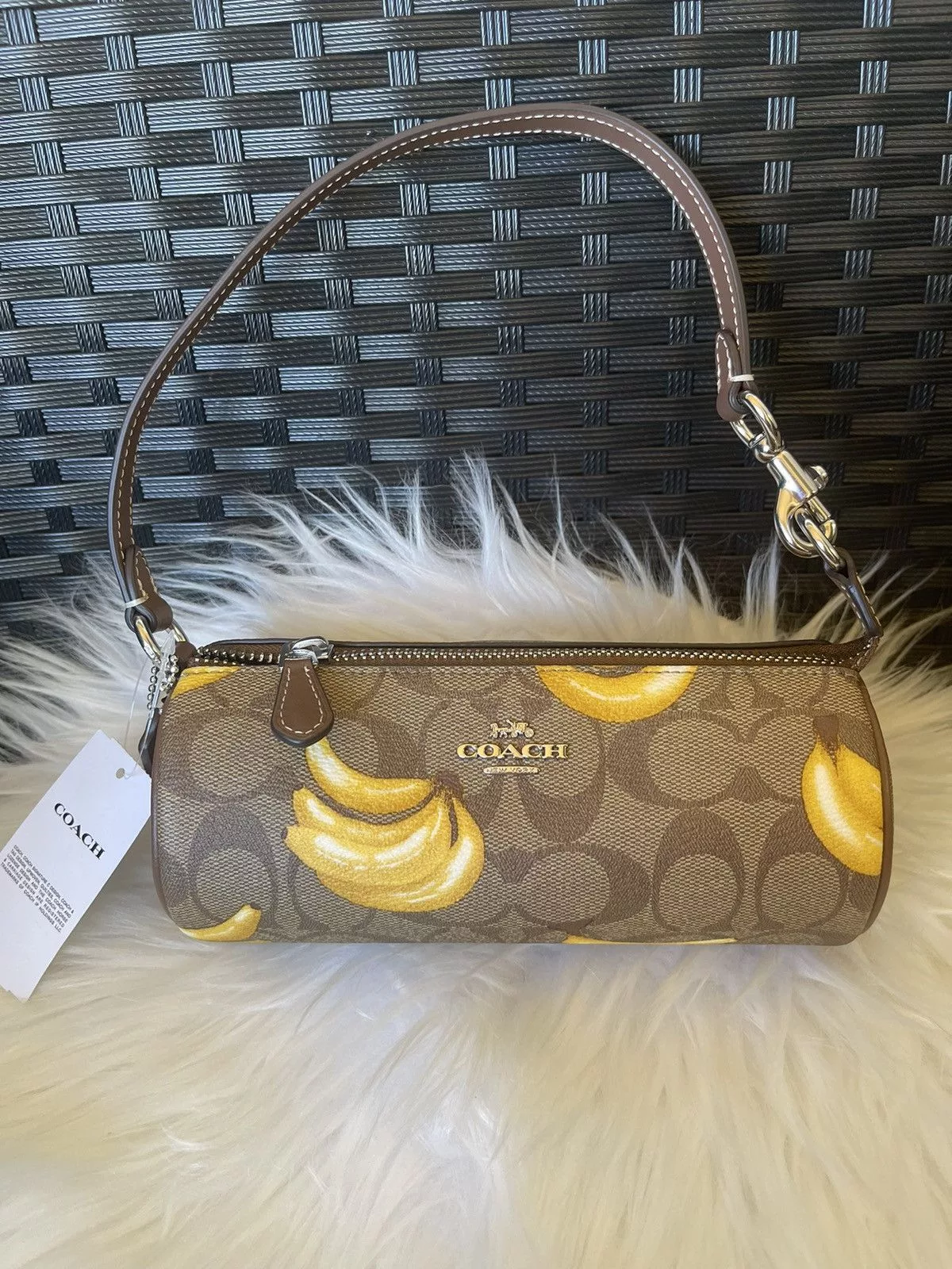 Coach Wallets Coach Nolita Barrel Bag In Signature Canvas With Banana Print Brown