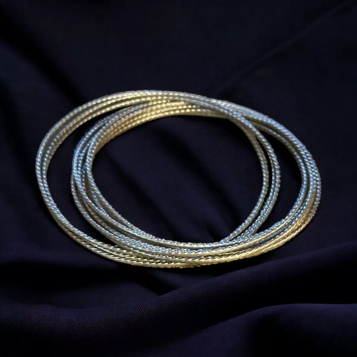 Other Bracelets Other Silver tone textured interlocking bangle bracelet