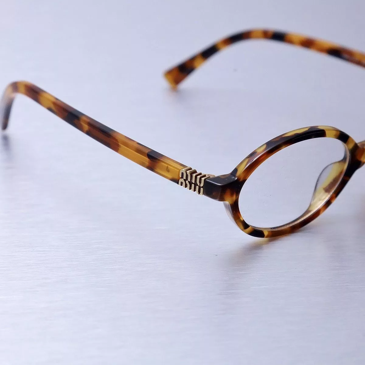 Miu Miu Glasses MIU MIU 0MU 01XV GLASSES Multi