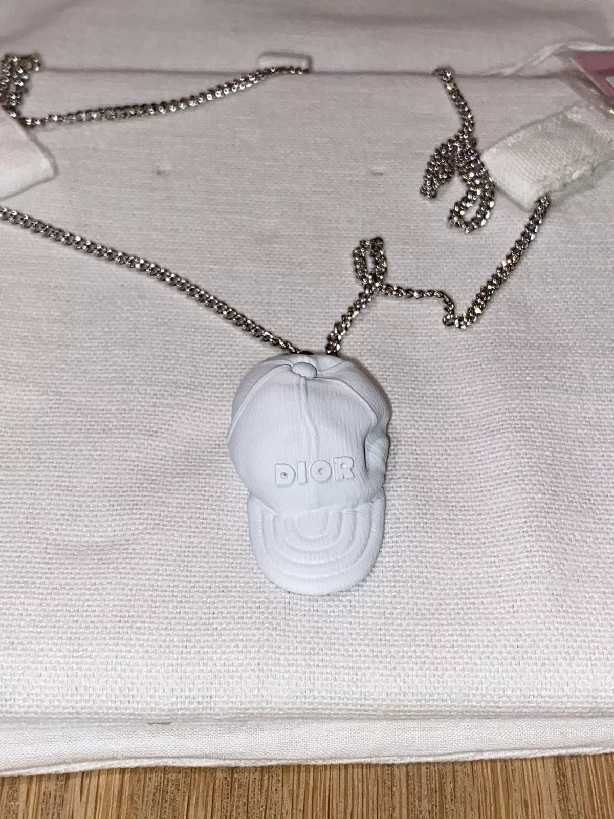 Daniel Arsham Jewelry Watches Daniel Arsham × Dior Dior x Daniel Arsham Eroded Cap Pendant Necklace White