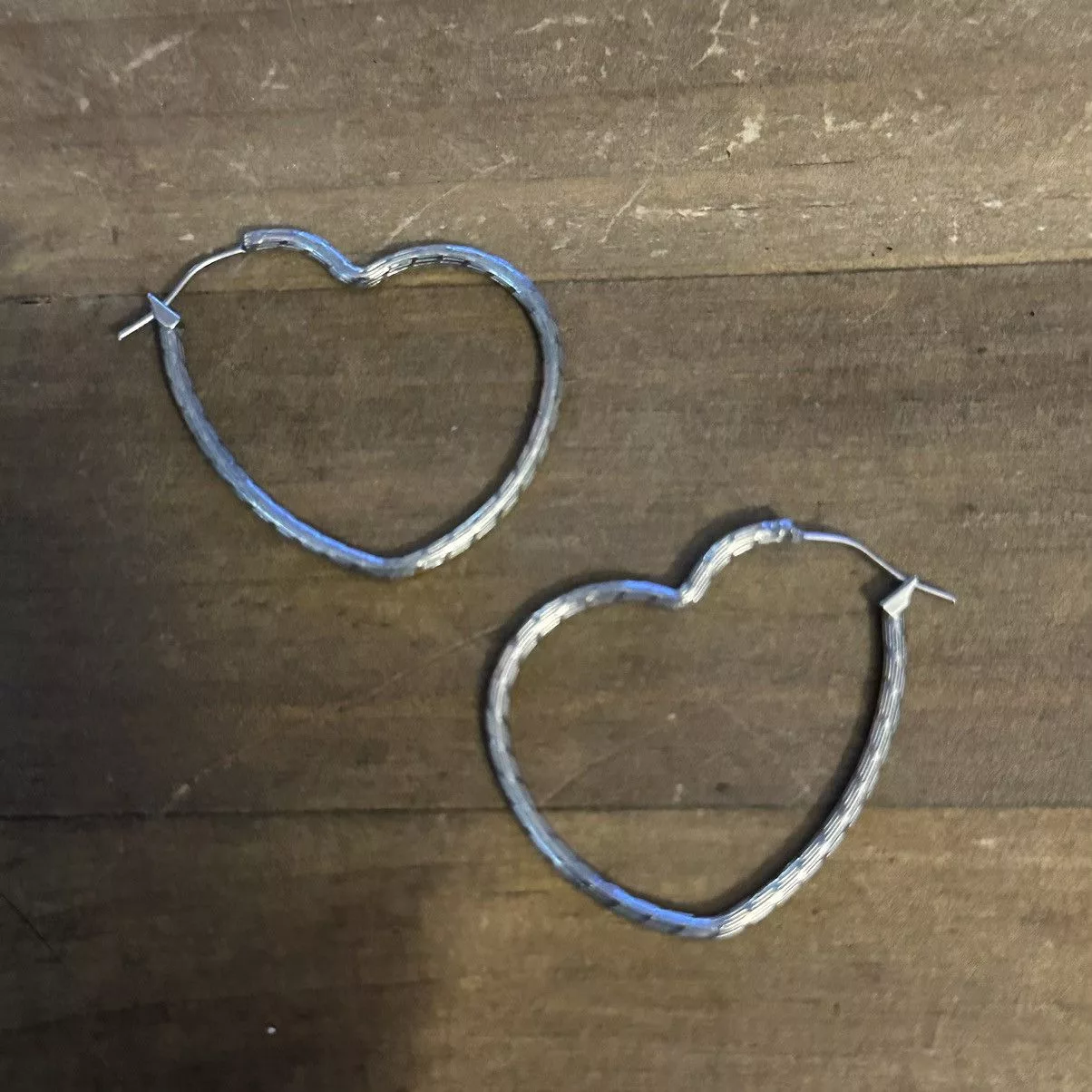 Other Earrings Other Silver tone heart shaped hoop earrings