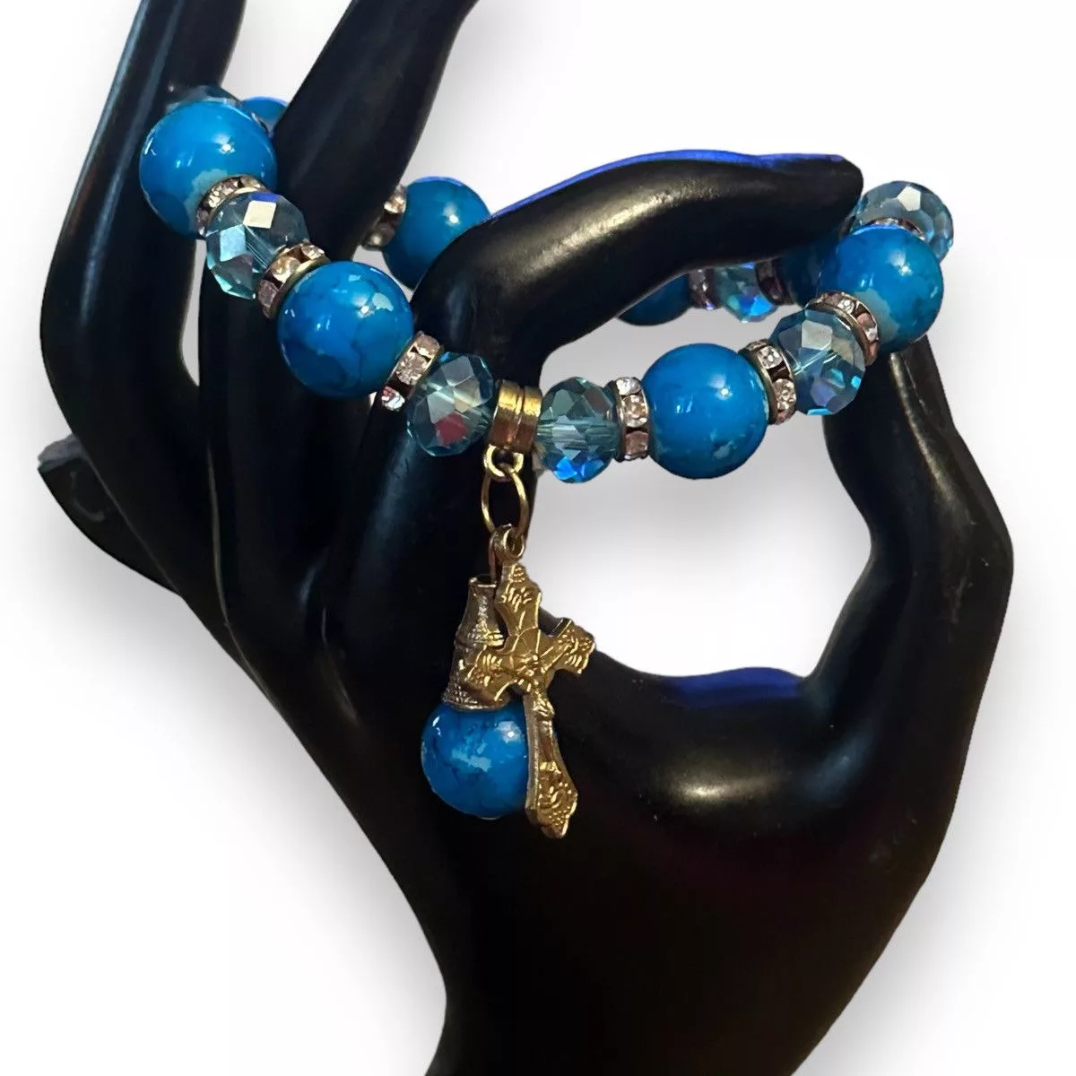 Other Bracelets Other Blue beaded stretch bracelet with cross charm