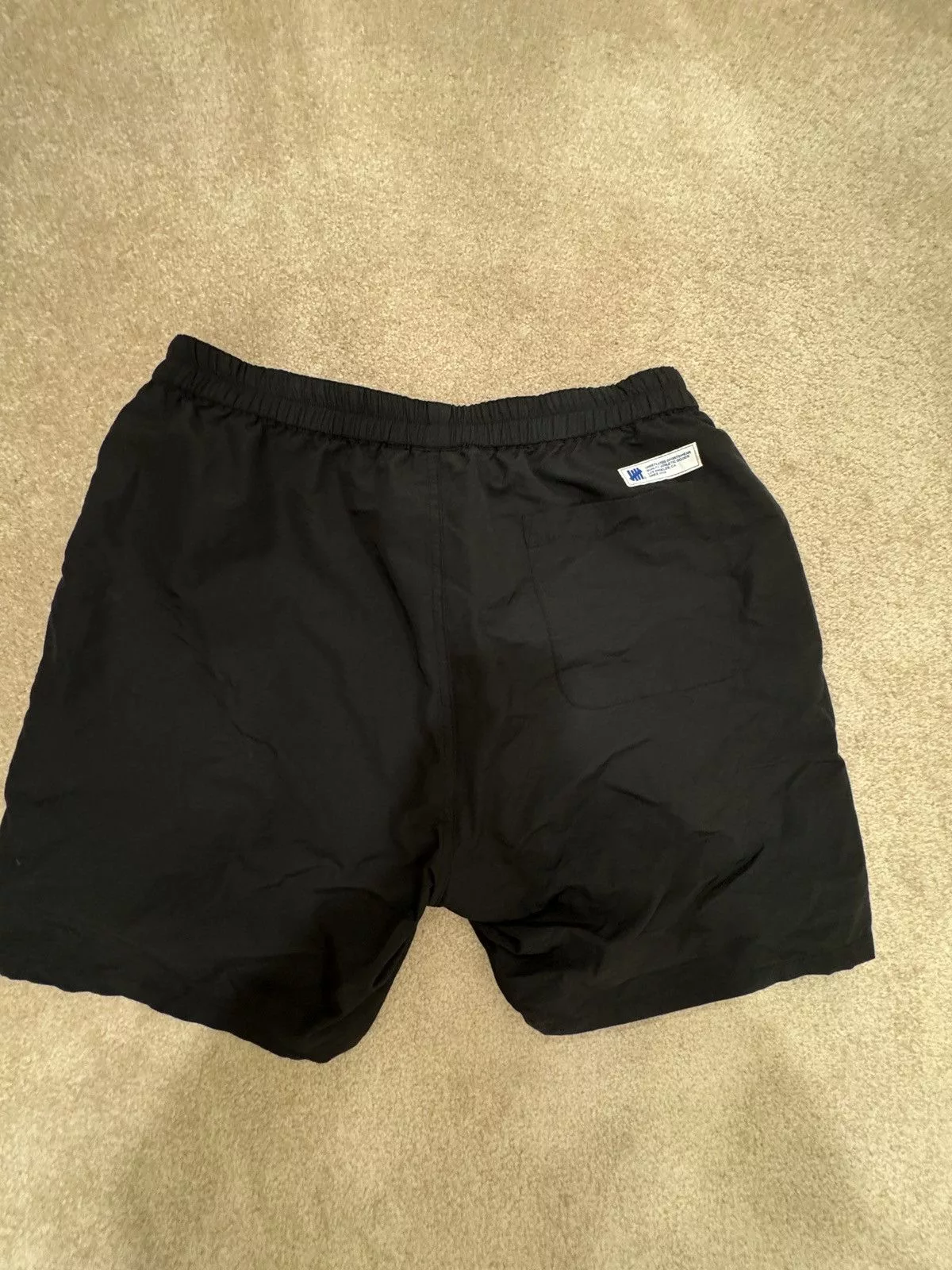 Undefeated Shorts UNDEFEATED Black Nylon Shorts inside bball mesh