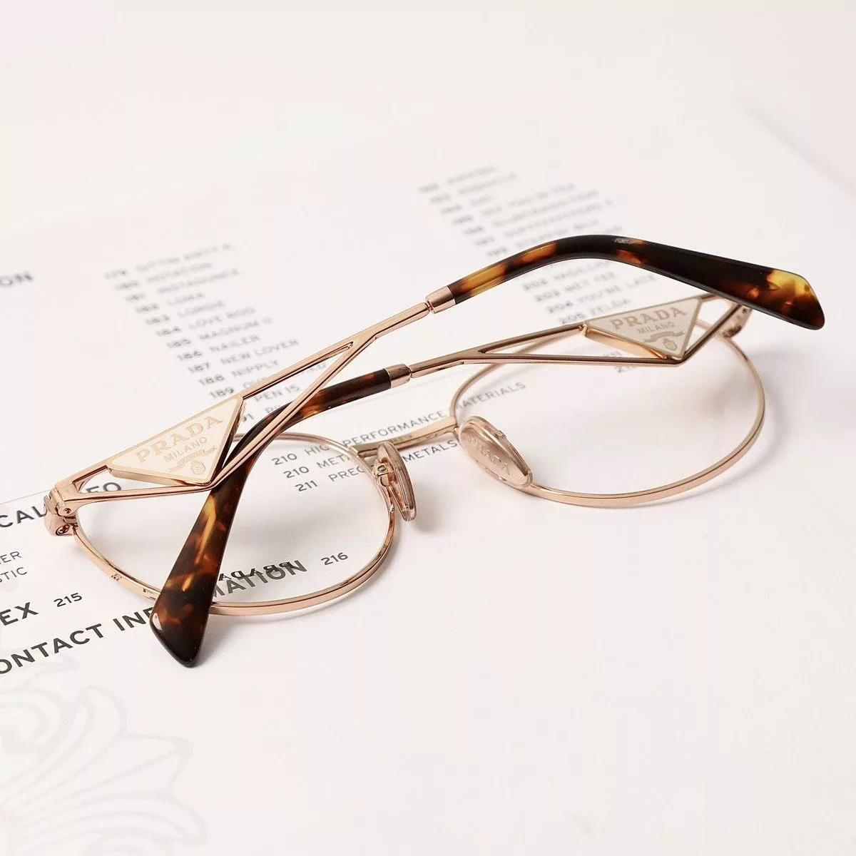Prada Glasses PRADA 0PR A50V GLASSES Gold