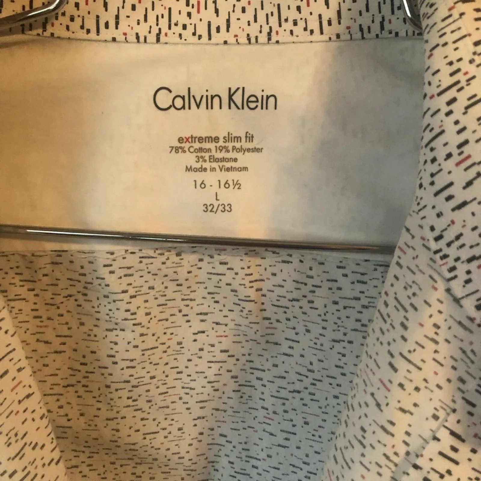 Calvin Klein Shirts Button Ups Calvin Klein Button down shirt. Spotted Extreme slim fit. White
