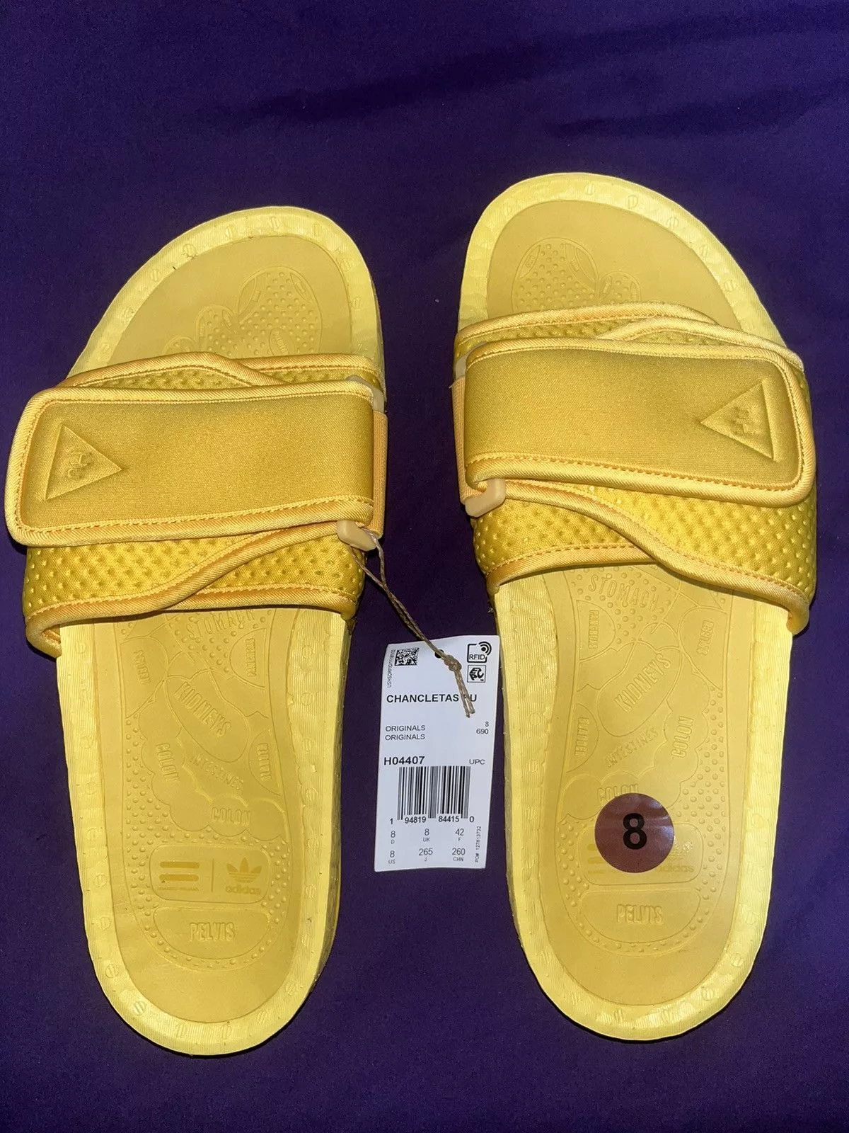 Adidas Sandals Adidas × Human Made × Pharrell Adidas Boost Slide Pharrell CHANCLETAS Gold