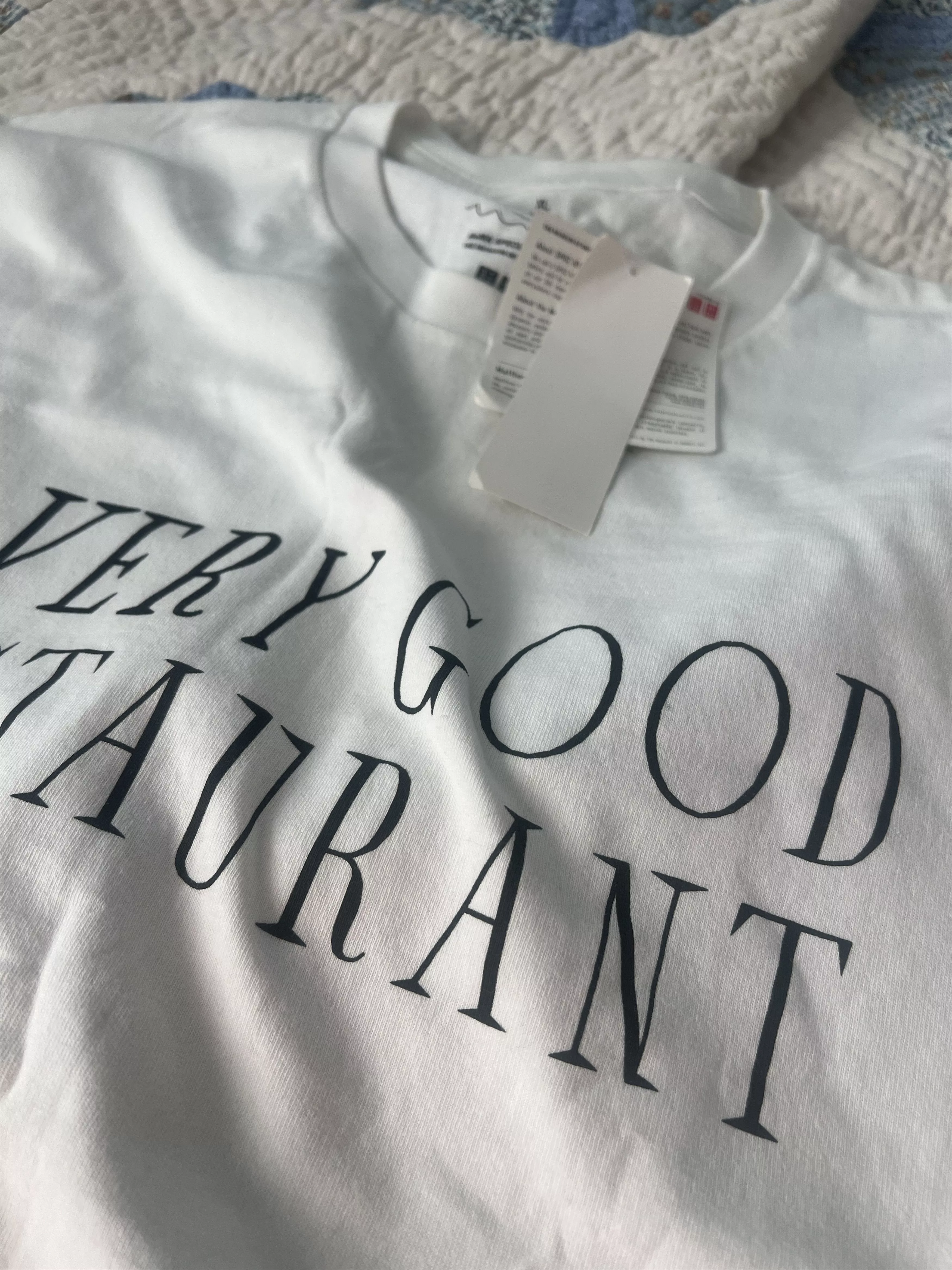 Uniqlo Short Sleeve T Shirts Uniqlo Graphic Tee White