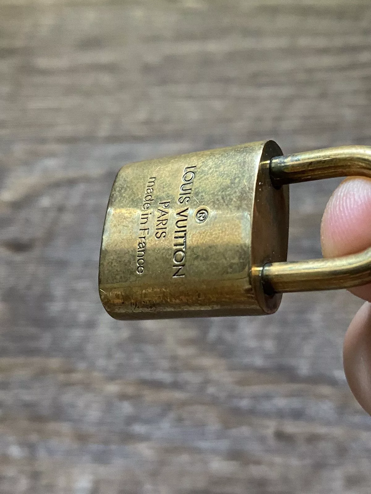 Louis Vuitton Miscellaneous Louis Vuitton Lock 332 Gold