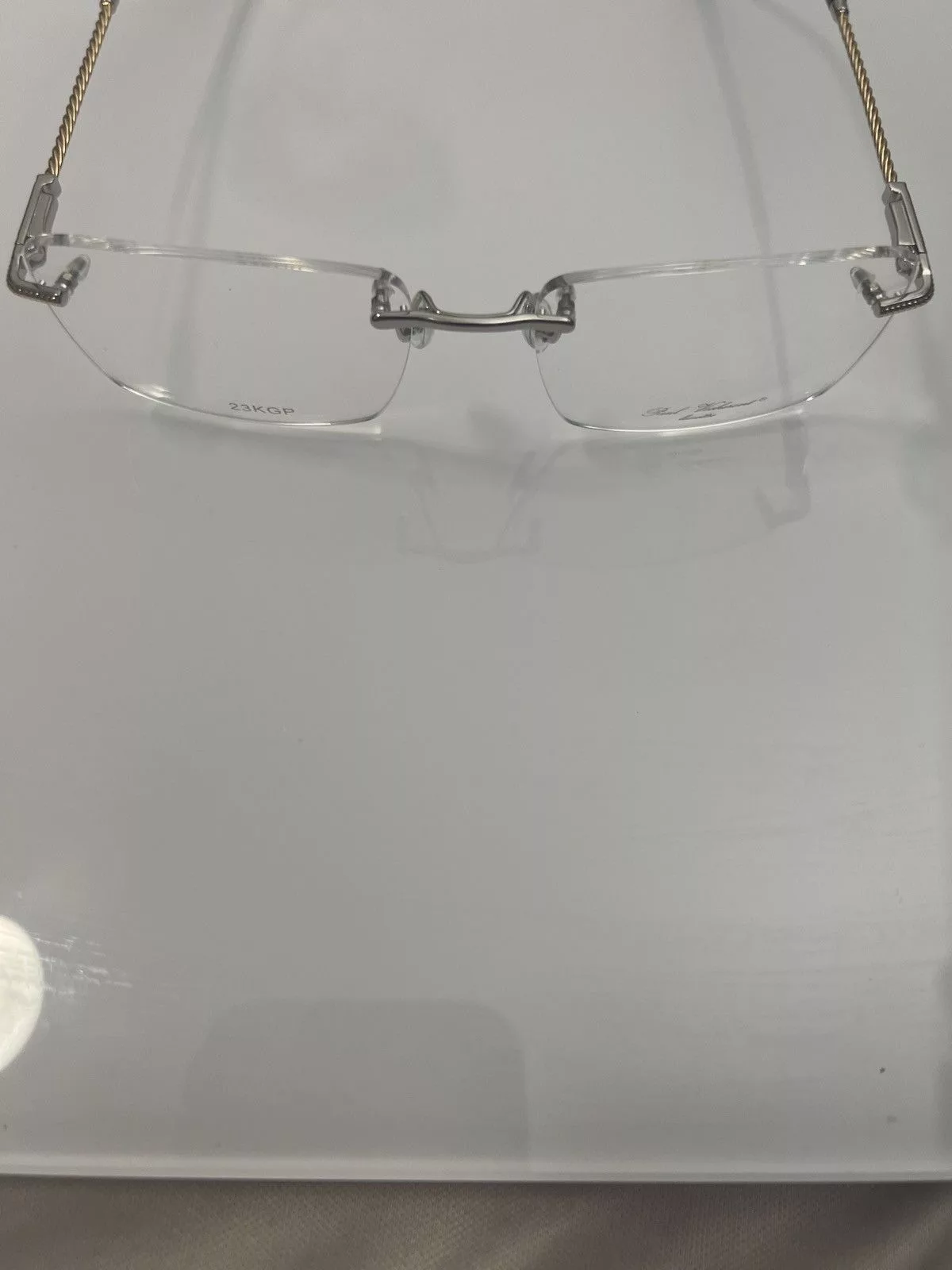 Other Glasses Other Paul Vosheront Rimless Gold