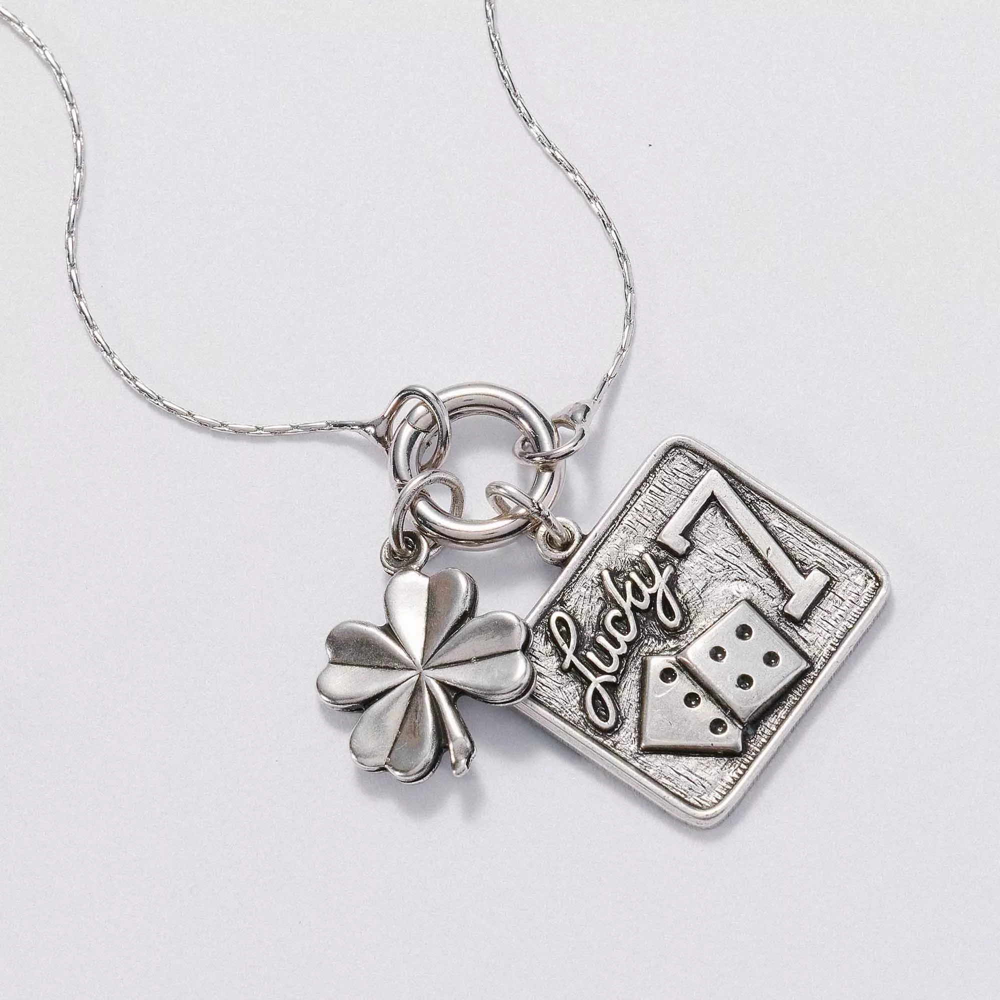&LIVY Take a Chance Expandable Necklace Set in silver featuring Lucky 7 dice charm and four-leaf clover charm on expandable chain