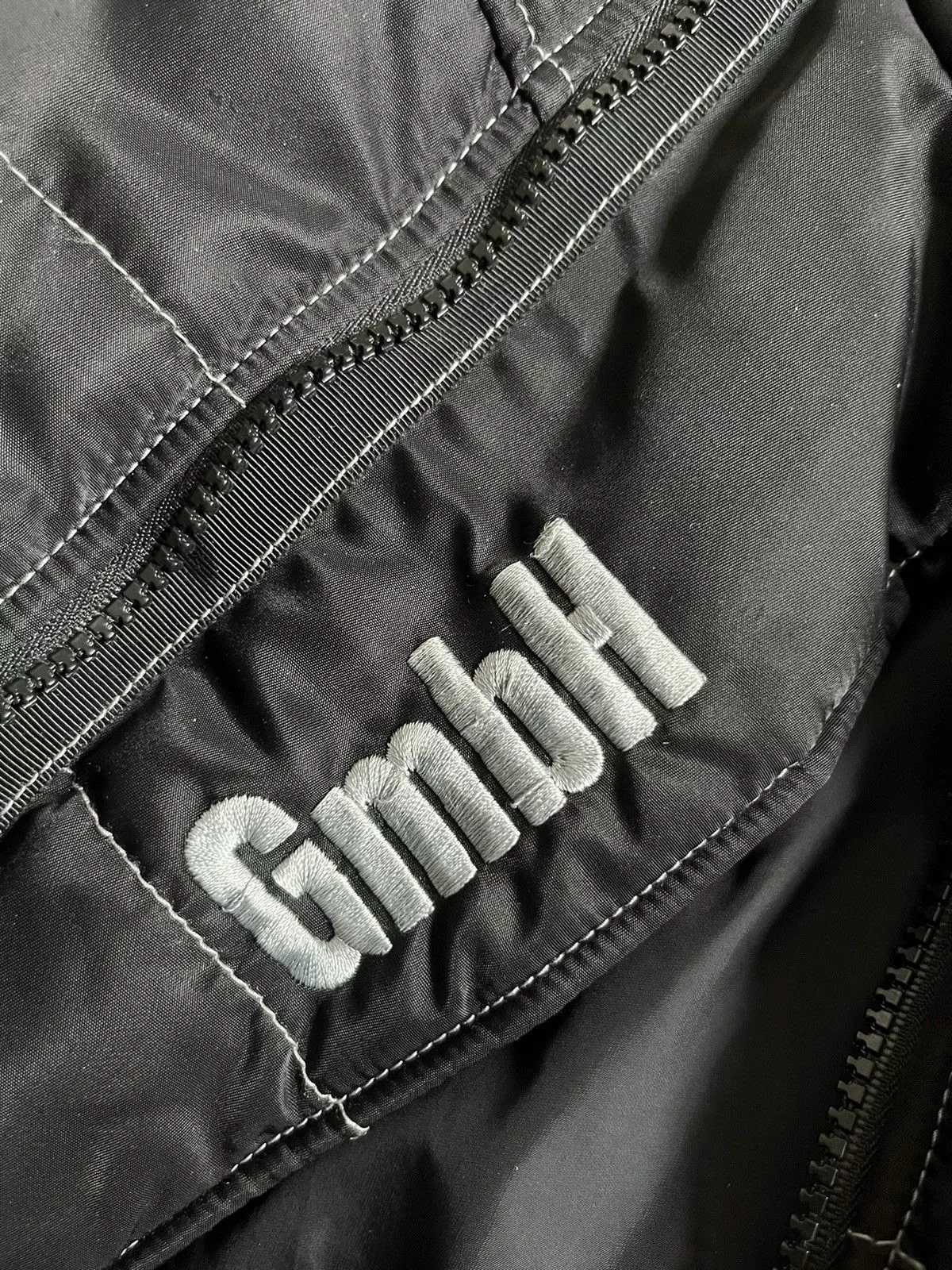 GmbH Down Jackets GmbH x Browns Harris High Neck Embroidered Puffer Jacket Black