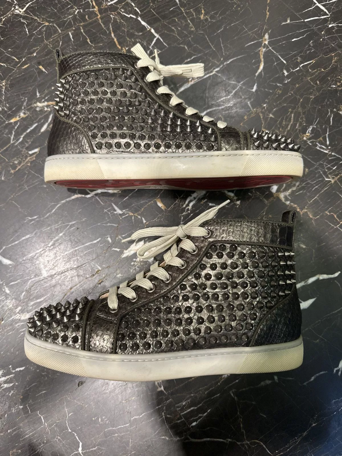 Christian Louboutin Hi Top Sneakers Christian Louboutin High top Python sneaker Silver