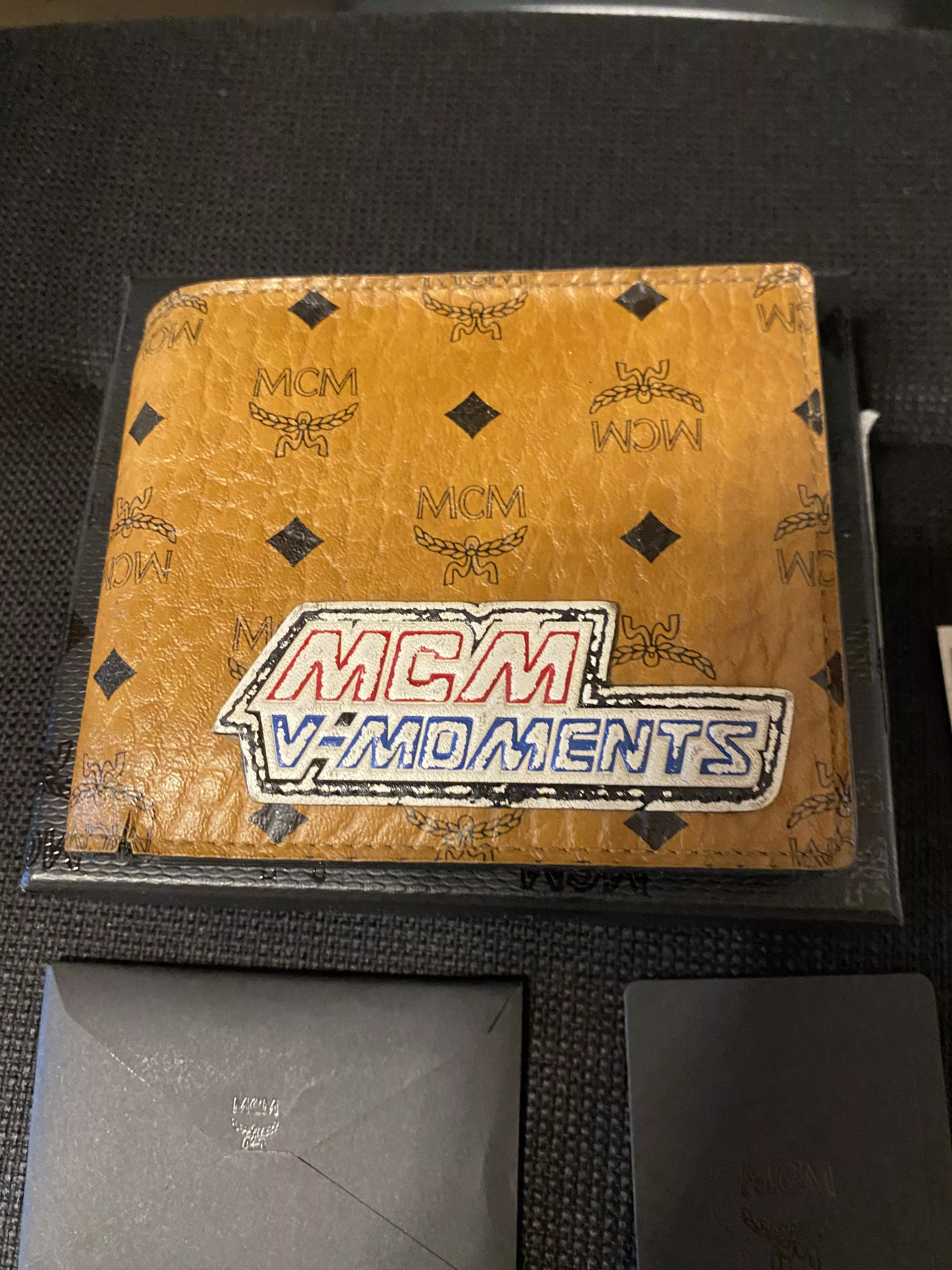 MCM Wallets MCM Wallet Cognac Distressed Victory patch logo print Brown