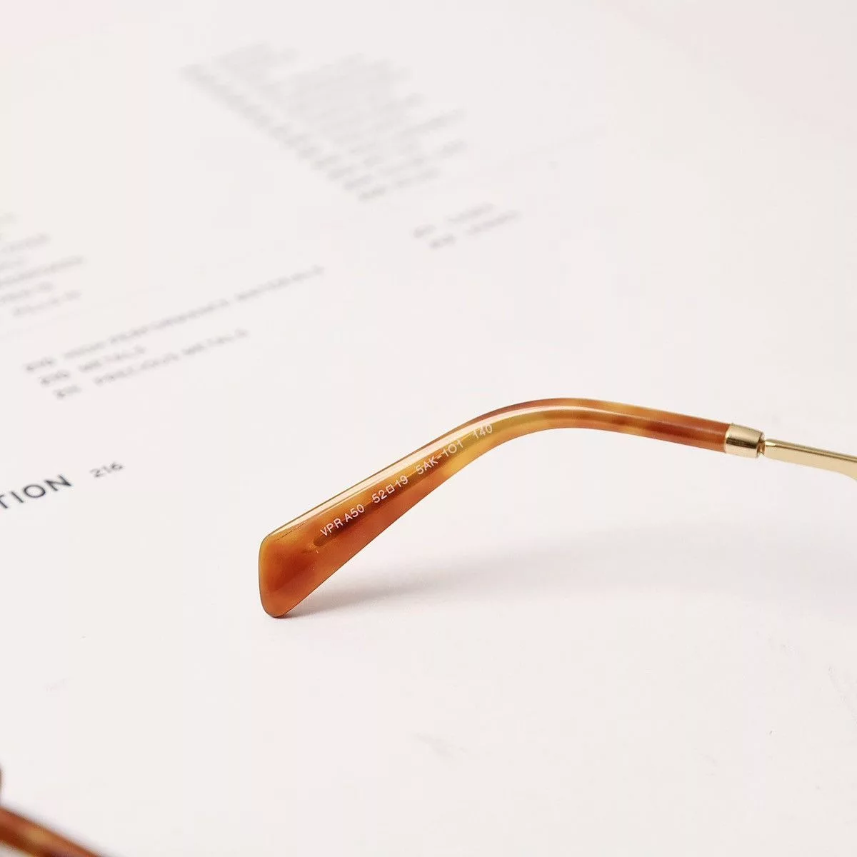 Prada Glasses PRADA 0PR A50V GLASSES Gold