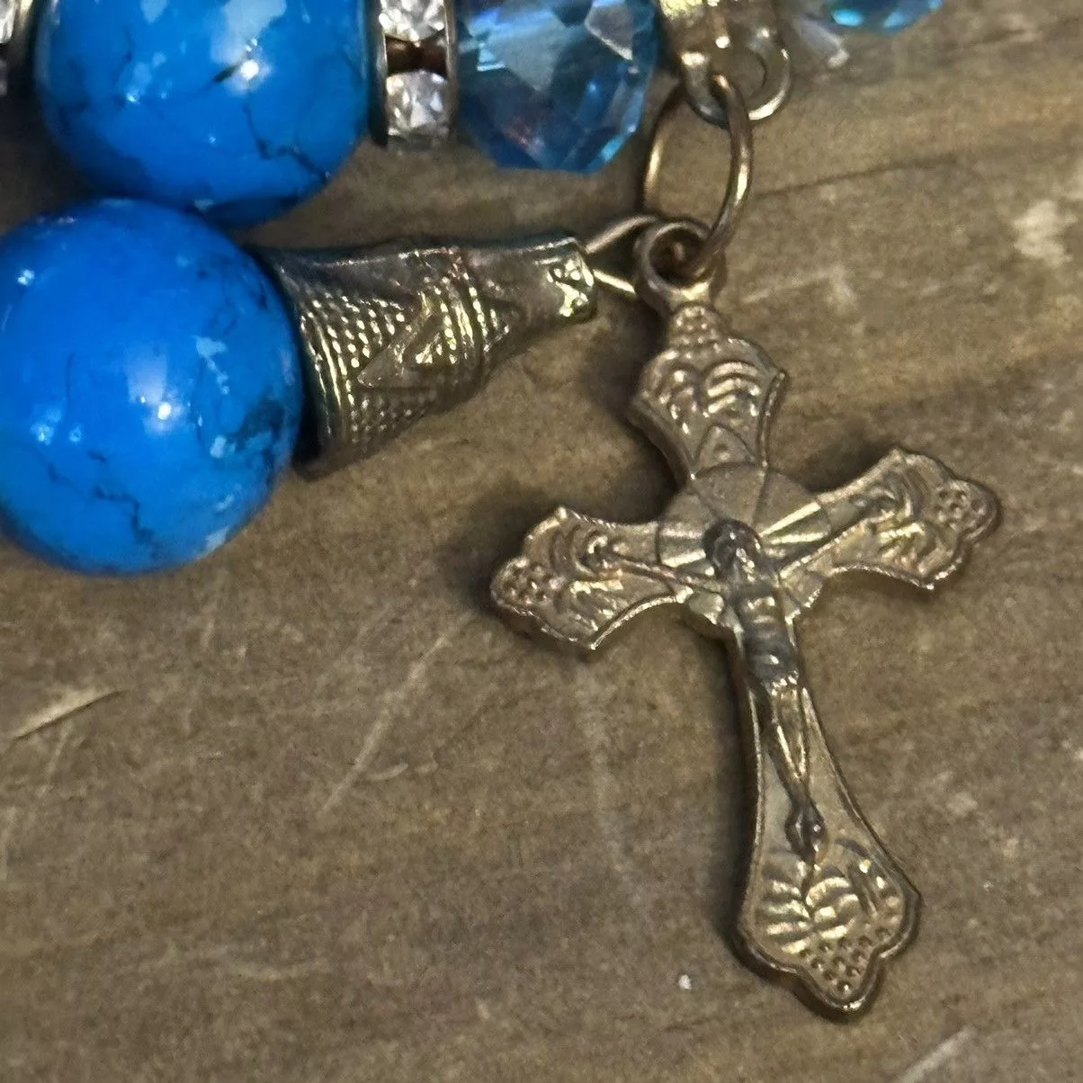 Other Bracelets Other Blue beaded stretch bracelet with cross charm
