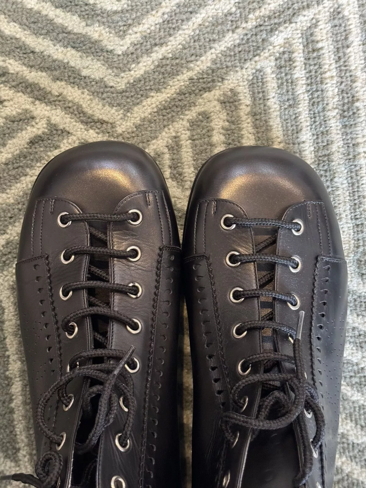 Gucci Boots GUCCI PERFORATED LEATHER JAKARTA BOOTS Black