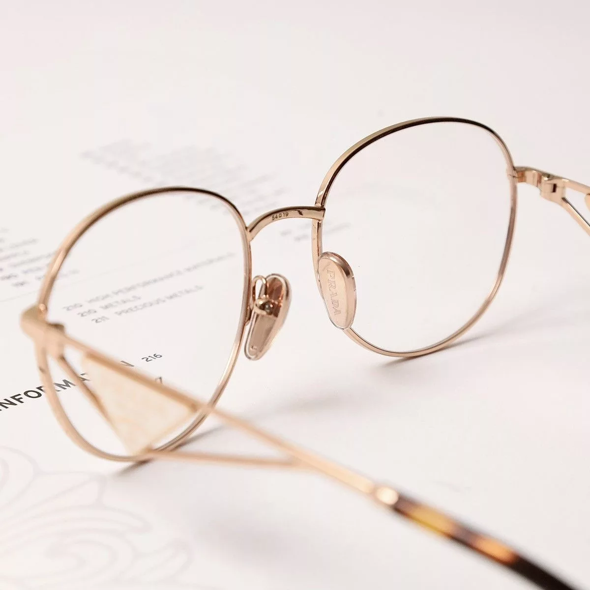 Prada Glasses PRADA 0PR A50V GLASSES Gold