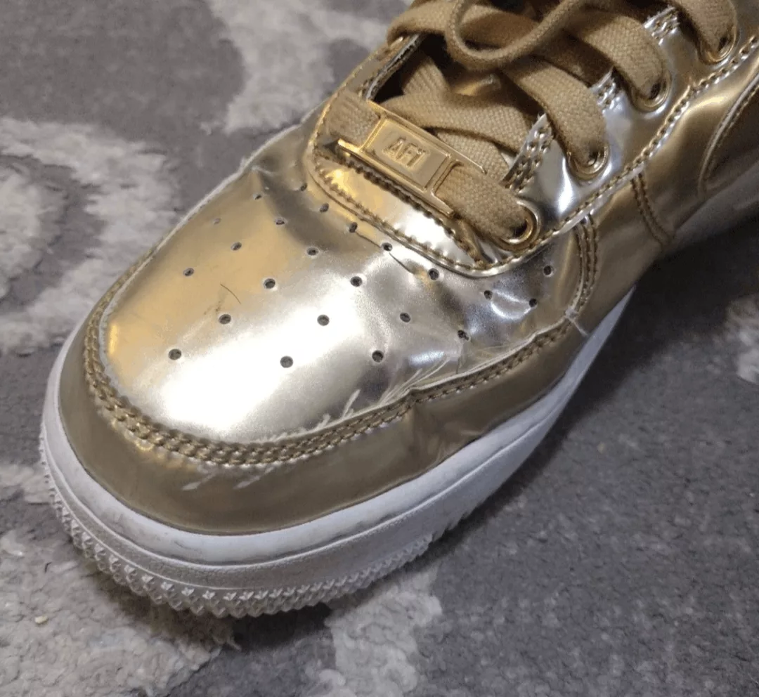 Nike Low Top Sneakers Nike AF1 metallic gold sneakers