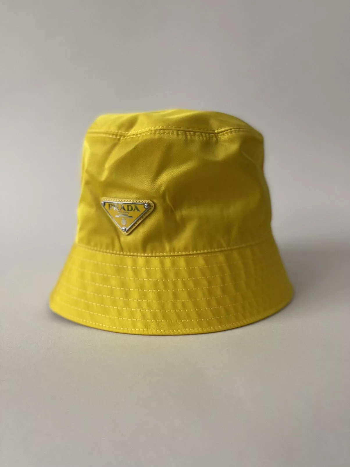 Prada Hats Prada Nylon Bucket with triangle logo Yellow