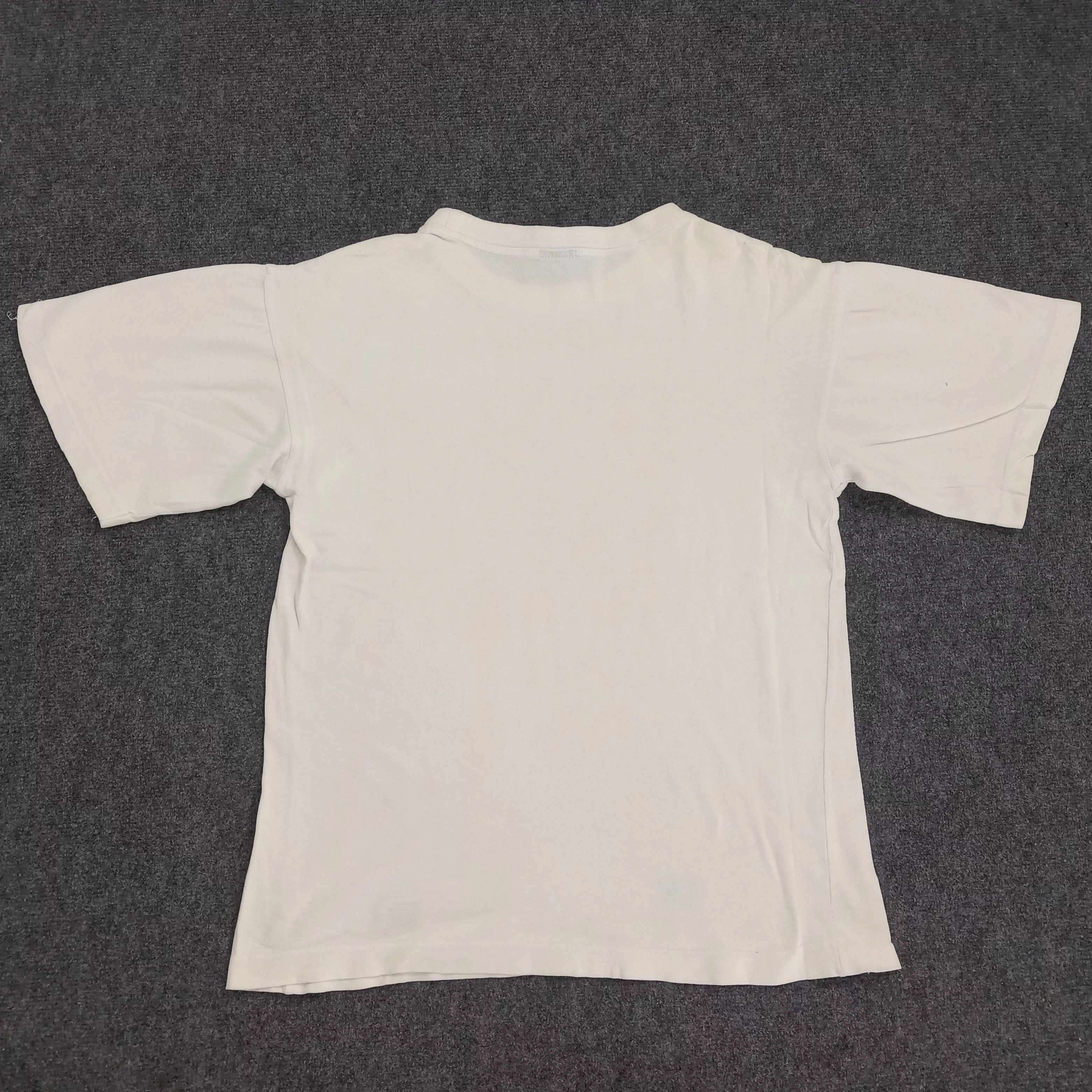 Universal Studios Short Sleeve T Shirts Universal Studios × Vintage James Bond 007 Tomorrow Never Dies Movie Tshirt White