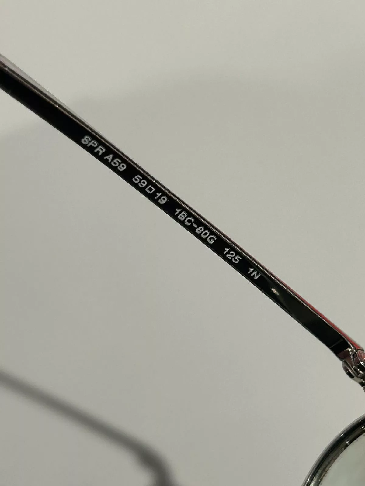 Prada Sunglasses Prada Oval Sunglasses Silver