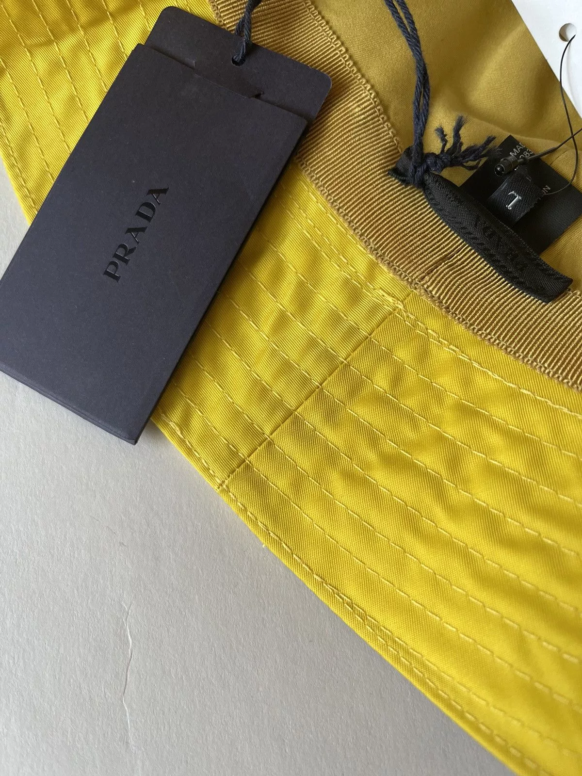 Prada Hats Prada Nylon Bucket with triangle logo Yellow