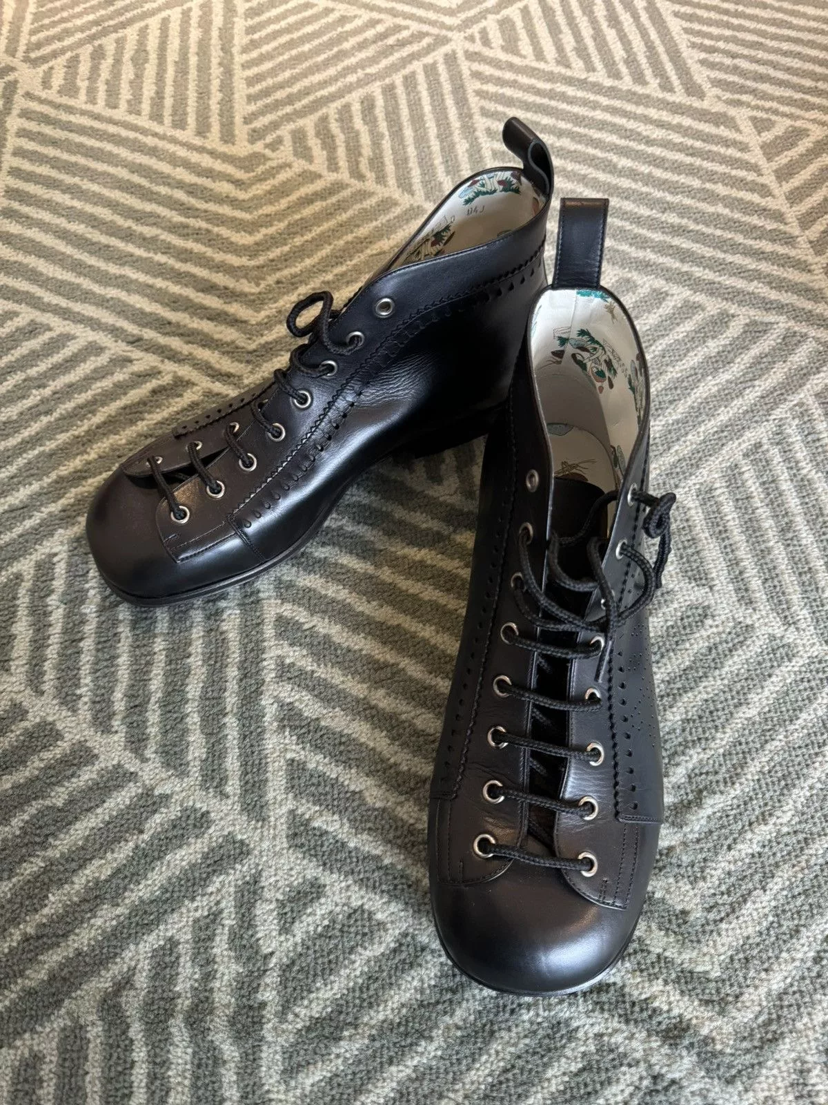 Gucci Boots GUCCI PERFORATED LEATHER JAKARTA BOOTS Black