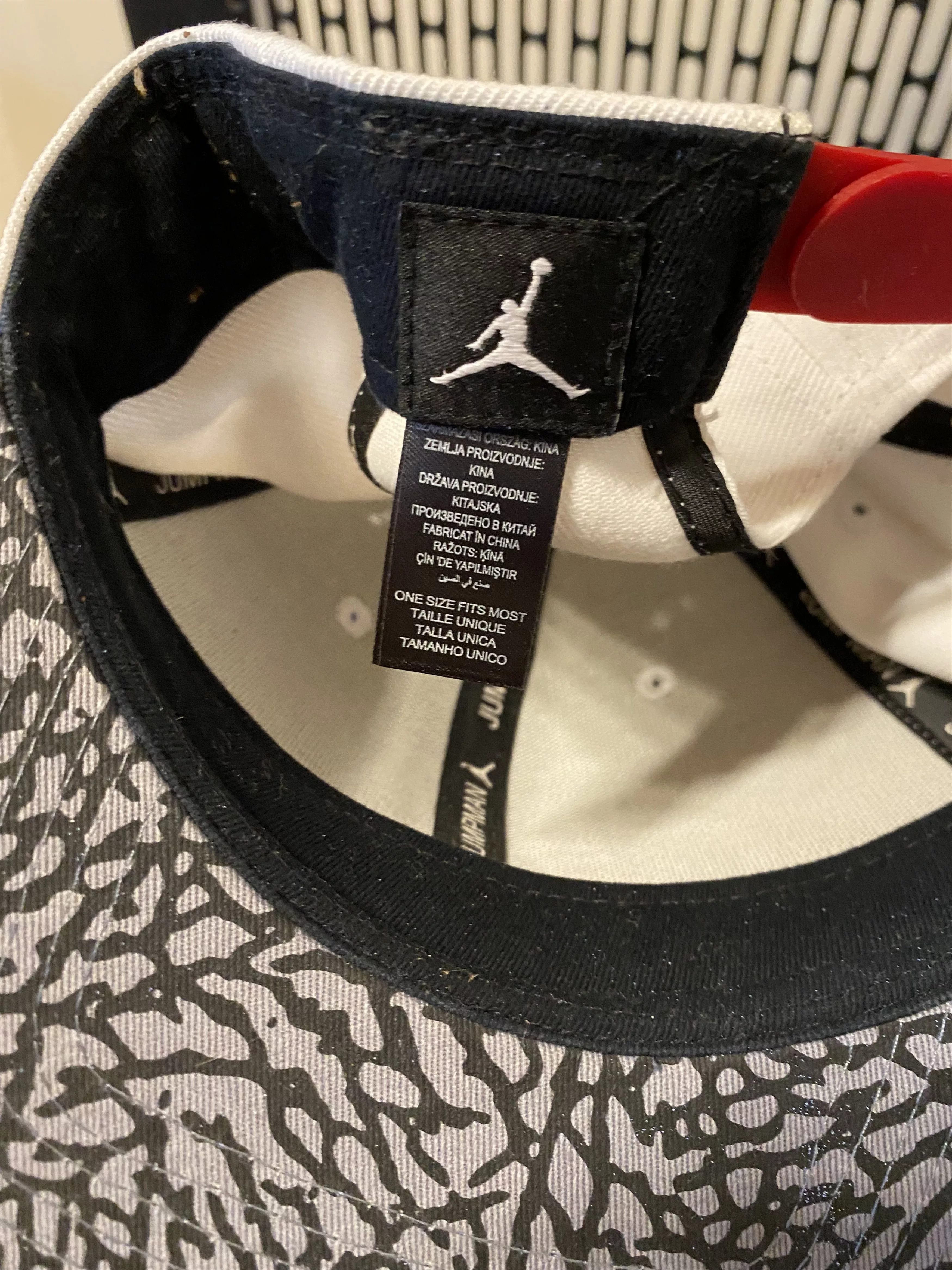 Jordan Brand Hats Jordan Brand × Nike Jordan jumpman red Elephant print cap White