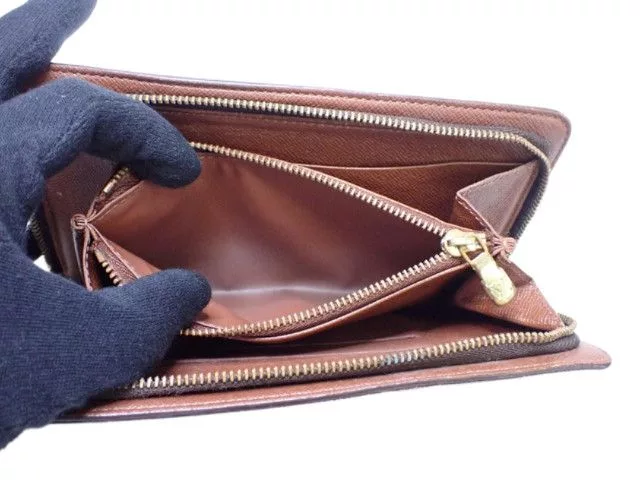Louis Vuitton Wallets Louis Vuitton Monogram Canvas Vintage Zippy Brown Wallet