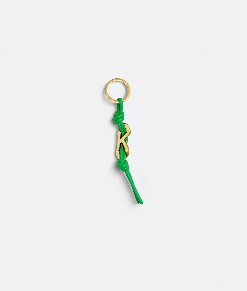Bottega Veneta Rings Bottega Veneta o1n1vont0624 Size: OS / Alphabet Keyring in Gold/Green Multi