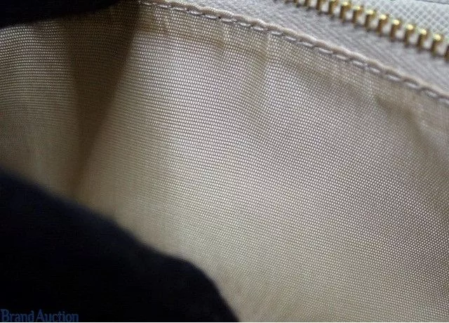 Prada Wallets Prada Saffiano Leather Zippy White Wallet